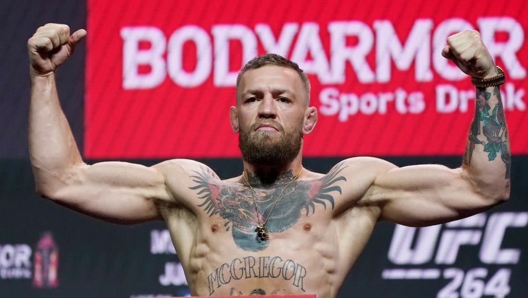 Conor McGregor poses during a ceremonial weigh-in for a UFC 264 mixed martial arts bout Friday, July 9, 2021, in Las Vegas.