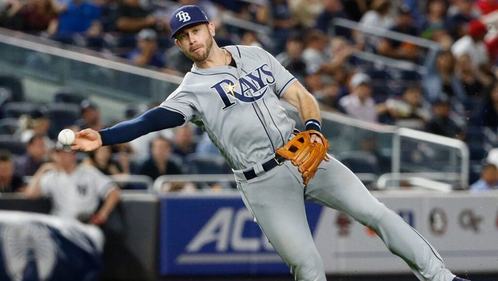 Tampa Bay Rays third baseman Evan Longoria throws to first after New York Yankees' Chase Headley grounded out to third in a baseball game in New York, Tuesday, Sept. 26, 2017.