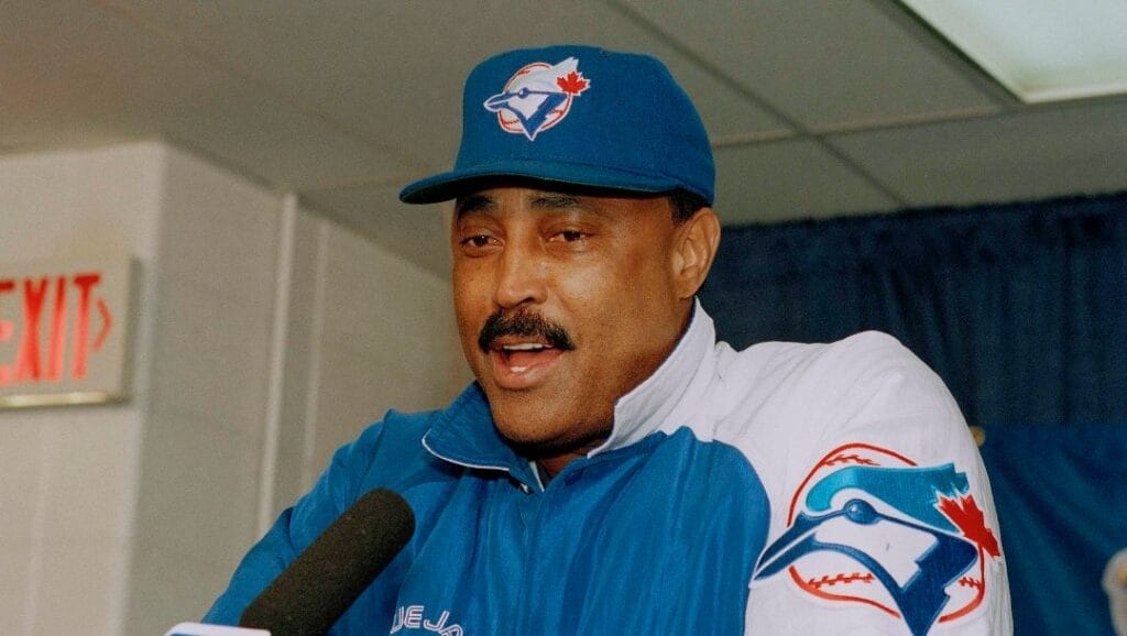 Toronto Blue Jays manager Cito Gaston talks with the media at a post-game news conference after the Blue Jays beat the Philadelphia Phillies 15-14 in game 4 of the World Series at Veterans Stadium in Philadelphia, Oct. 20, 1993.