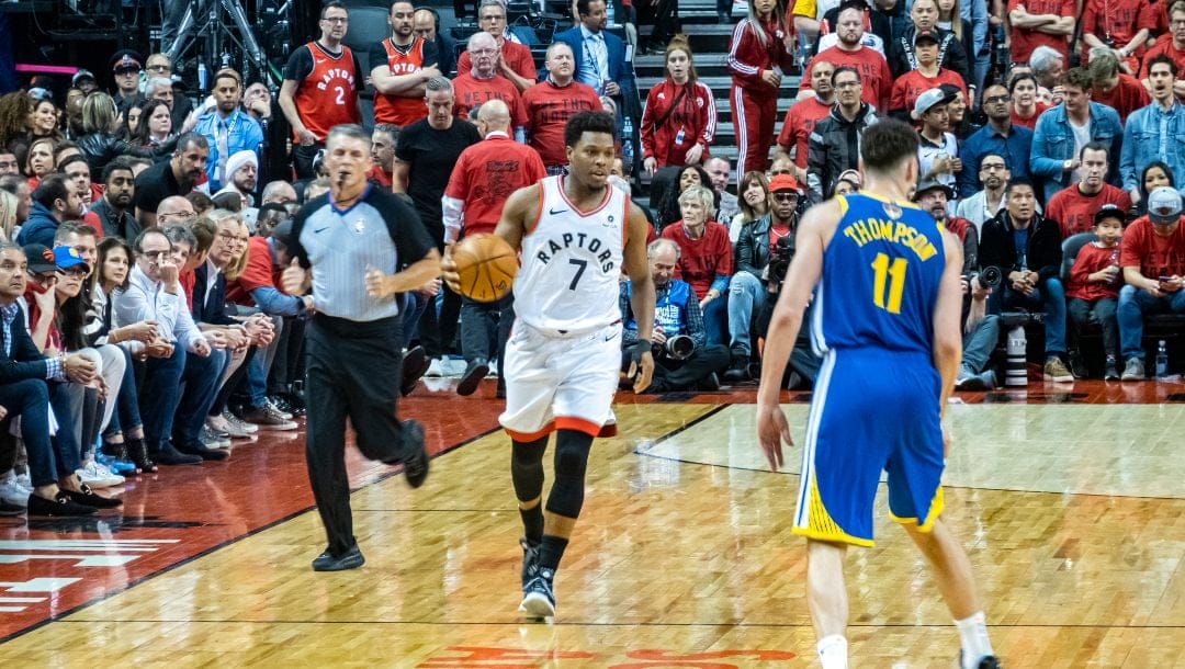 Kyle Lowry dribbles the ball against the Golden State Warriors.