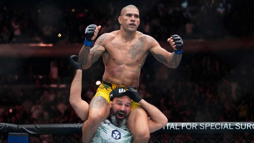 Brazil's Alex Pereira celebrates after a light heavyweight title bout against Czech Republic's Jirí Procházka at the UFC 295.