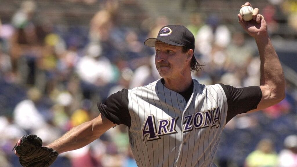 Arizona Diamondbacks pitcher Randy Johnson delivers a pitch in the ninth inning against the San Diego Padres.