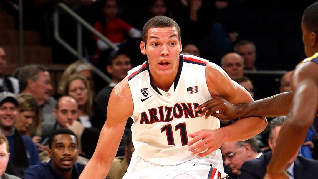Arizona's Aaron Gordon (11) advances the ball against Drexel during the first half of an NCAA college basketball game.