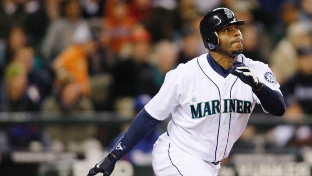 This is an Oct. 3, 2009, file photo showing Seattle Mariners' Ken Griffey Jr. hitting a solo home run on a pitch from Texas Rangers' Tommy Hunter during the fourth inning of a baseball game in Seattle.