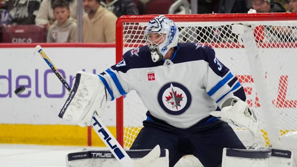 Winnipeg Jets goaltender Connor Hellebuyck makes a save during the second period of an NHL hockey game against the Chicago Blackhawks, Friday, Feb. 23, 2024, in Chicago.