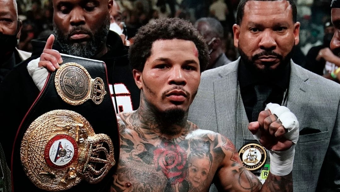 FILE - Gervonta Davis poses for photographs after a WBA lightweight championship boxing bout against Rolando Romero.