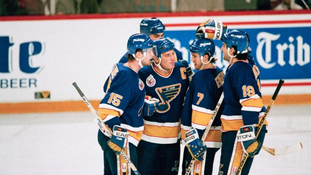 St. Louis Blues Brett Hull, second from left, is congratulated by teammates Craig Janney (15), Nelson Emerson (7) and Brendan Shanahan (19) after Hulls first goal in the first period against the Chicago Blackhawks in the Norris Division semifinals in Chicago on April 22, 1993.