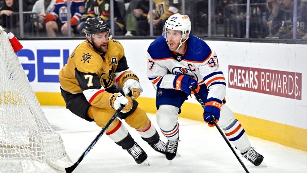 Edmonton Oilers center Connor McDavid (97) skates with the puck against Vegas Golden Knights defenseman Alex Pietrangelo (7) during the first period of an NHL hockey game Tuesday, Feb. 6, 2024, in Las Vegas.