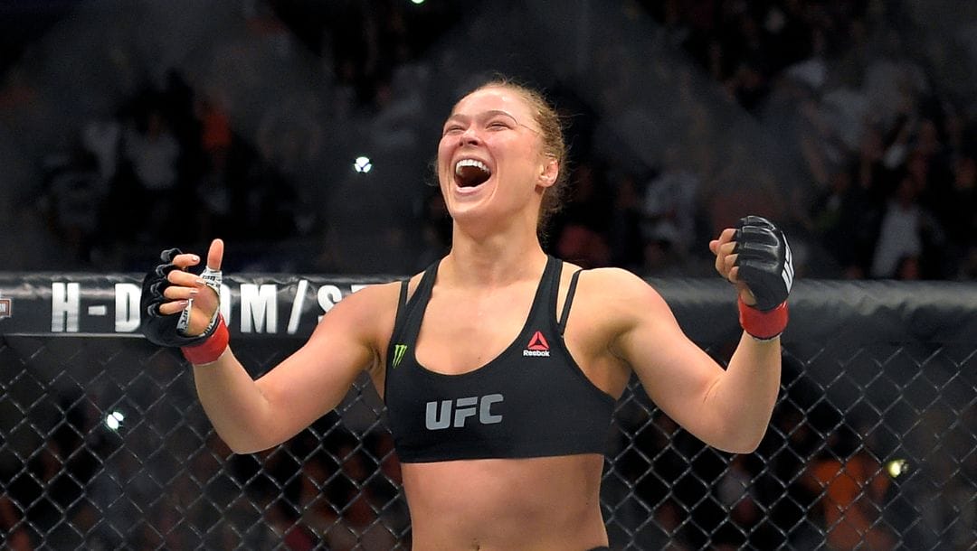 FILE - In this Feb. 28, 2015, file photo, Ronda Rousey celebrates after defeating Cat Zingano in a UFC 184 mixed martial arts.