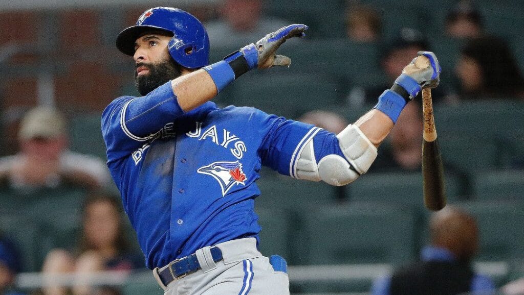 Toronto Blue Jays' Jose Bautista (19) follows through on a solo home run during the eighth inning against the Atlanta Braves in a baseball game Wednesday, May 17, 2017, in Atlanta.
