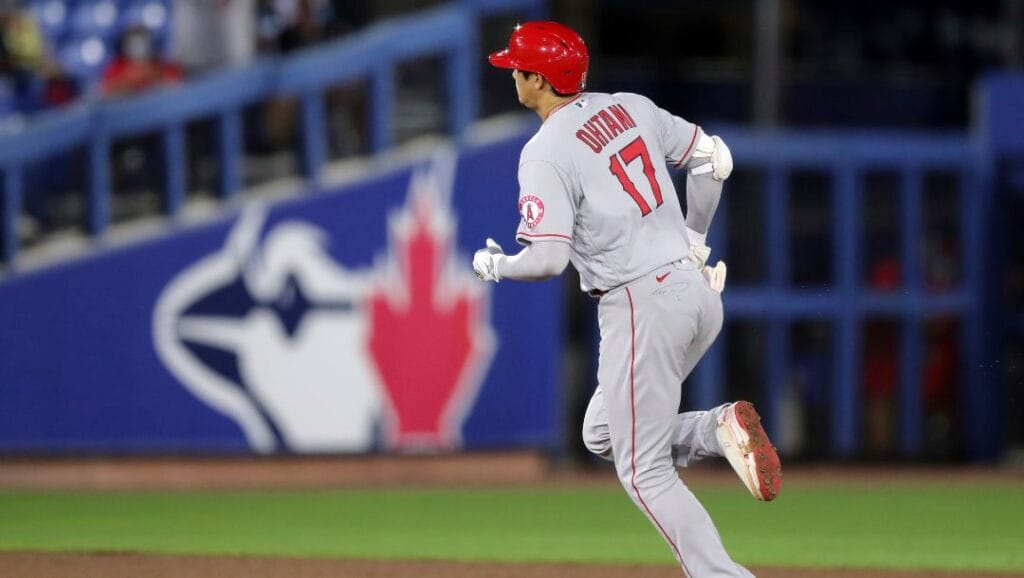 Los Angeles Angels' Shohei Ohtani runs the bases after his solo home run against the Toronto Blue Jays during the fifth inning of a baseball game Friday, April 9, 2021, in Dunedin, Fla.