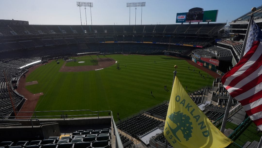 A city of Oakland flag flies at Oakland Alameda Coliseum before a baseball game between the Oakland Athletics and the Colorado Rockies in Oakland, Calif., Wednesday, May 22, 2024.