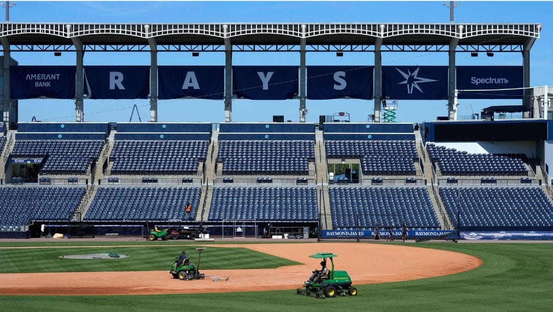 Tampa Bay Rays grounds crew members prepare the field at George M. Steinbrenner Field during a stadium tour Wednesday.
