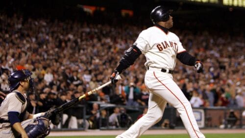 San Francisco Giants' Barry Bonds follows his 700th career home run off San Diego Padres' pitcher John Peavy.