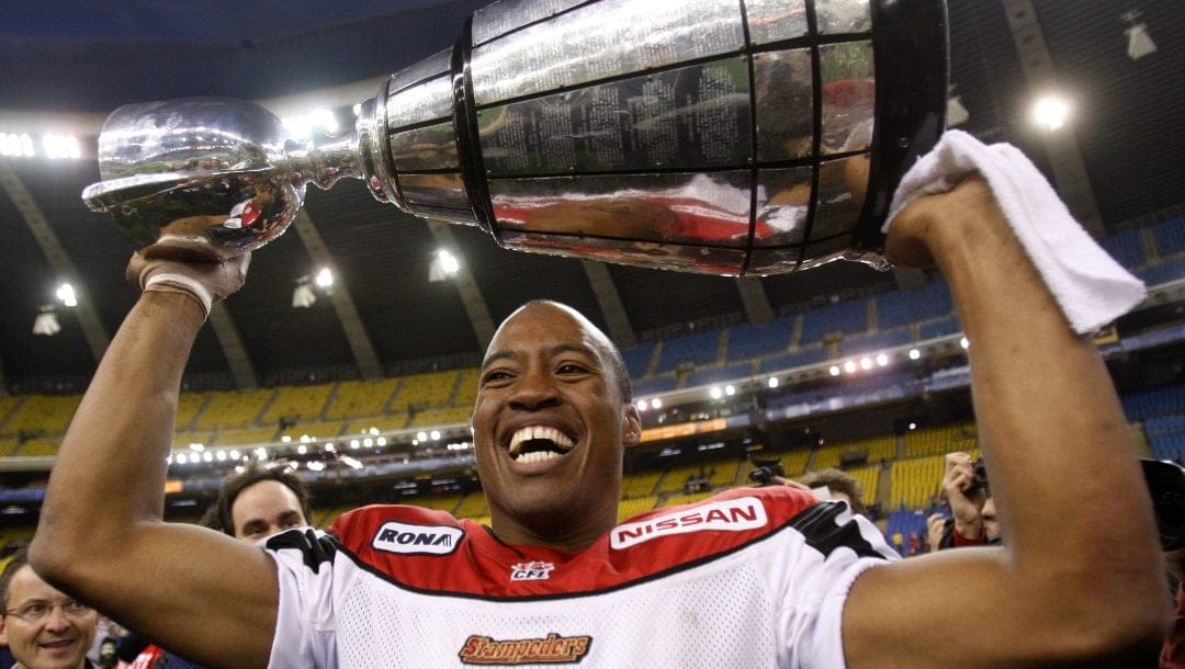 Calgary Stampeders quarterback Henry Burris holds Grey Cup after Calgary defeated the Montreal Alouettes in the Canadian Football League Grey Cup on Sunday, Nov. 23, 2008, in Montreal.