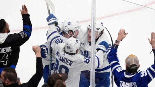 Toronto Maple Leafs' William Nylander (88) celebrates his goal with Auston Matthews (34) and Tyler Bertuzzi (59) during the third period of Game 7 of an NHL hockey Stanley Cup first-round playoff series against the Boston Bruins, Saturday, May 4, 2024, in Boston.