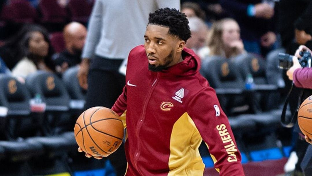 Donovan Mitchell of the Cleveland Cavaliers warming up during an NBA game in November 2023.