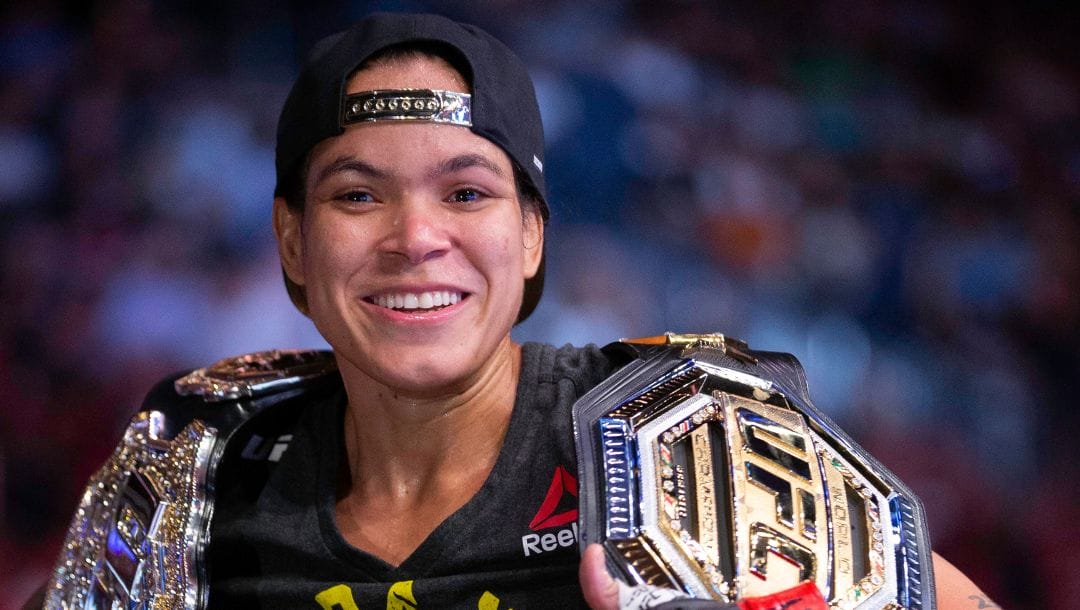 Amanda Nunes smiles after victory over Holly Holm during their women's bantamweight mixed martial arts title bout at UFC 239.