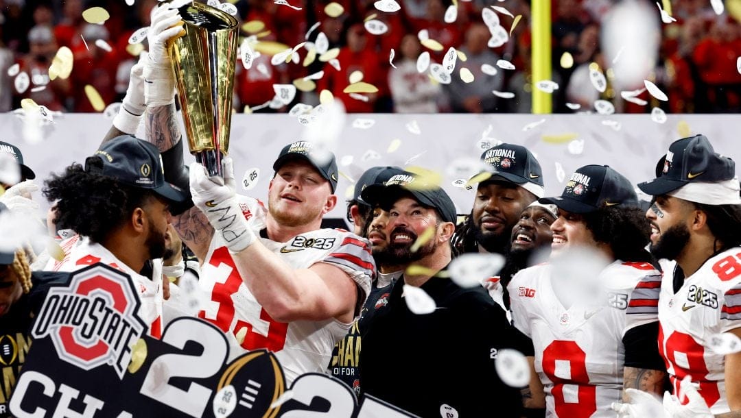 Ohio State players celebrate after winning the College Football Playoff national championship game over Notre Dame, Tuesday, Jan. 21, 2025, in Atlanta.