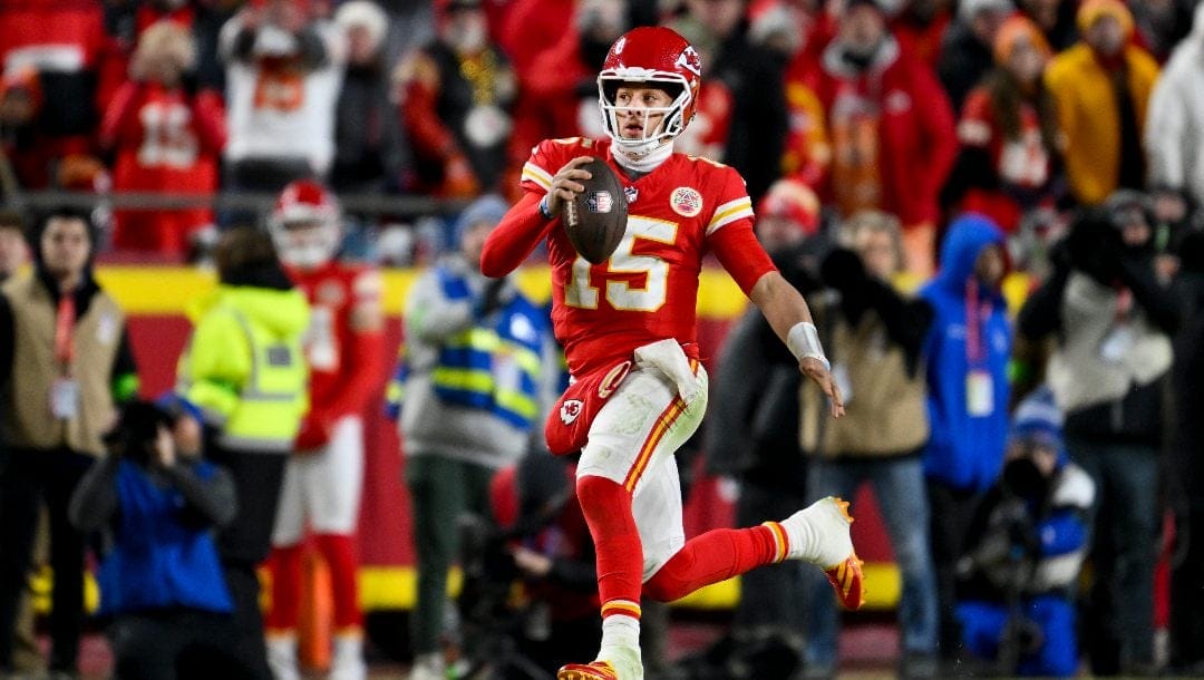 Kansas City Chiefs quarterback Patrick Mahomes runs the ball against the Buffalo Bills during the second half of the NFL AFC Championship football game, Sunday, Jan. 26, 2025 in Kansas City, Mo. The Chiefs defeated the Bills by a score of 32-29.