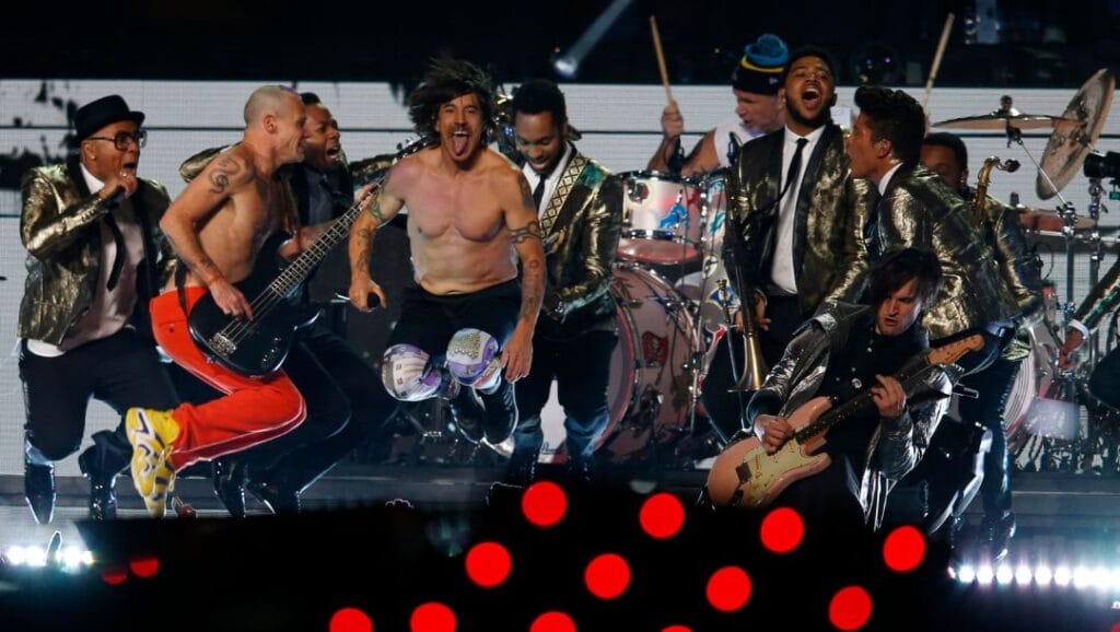 The Red Hot Chili Peppers perform with Bruno Mars during the halftime show of the NFL Super Bowl XLVIII football game.