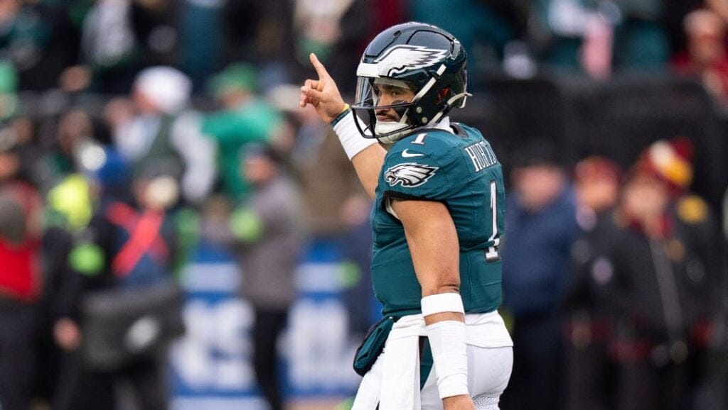 Philadelphia Eagles quarterback Jalen Hurts (1) reacts to the touchdown run by Saquon Barkley during the NFL championship.