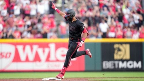 Cincinnati Reds' Rece Hinds reacts as he rounds the bases after hitting his career first MLB grand slam during the third inning.