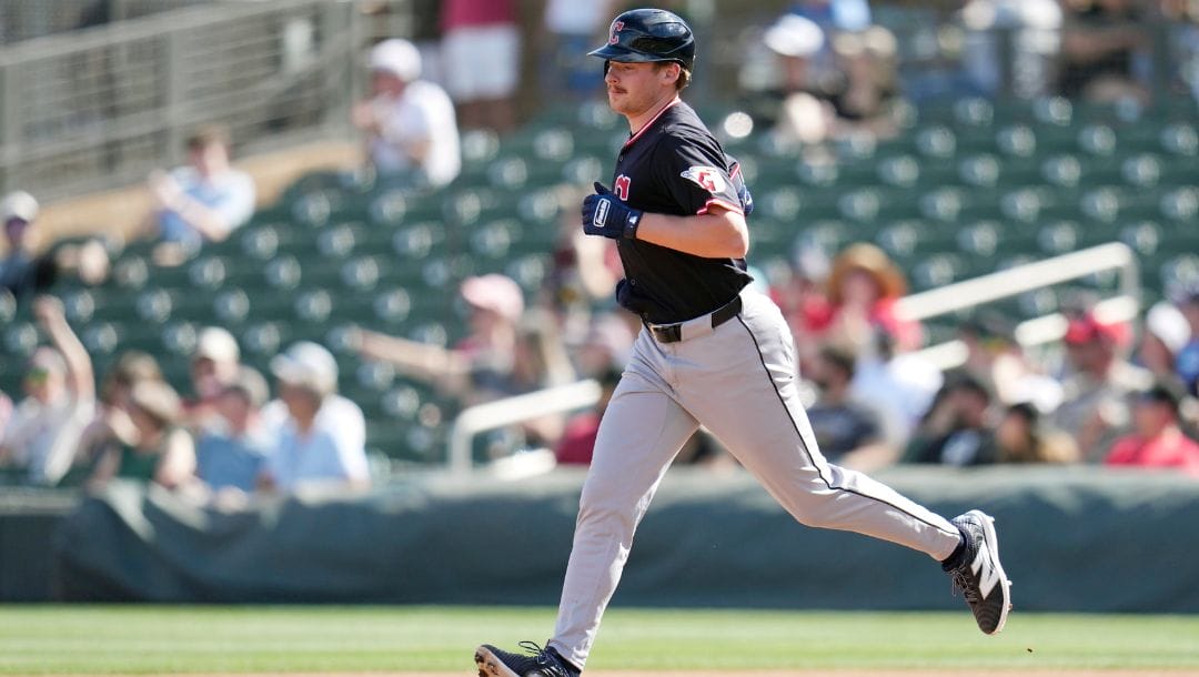 Cleveland Guardians' Kyle Manzardo rounds the bases after hitting a two-run home run against the Arizona Diamondbacks.