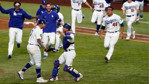 FILE - In this Oct. 27, 2020, file photo, the Los Angeles Dodgers celebrate at Globe Life Field after defeating the Tampa Bay Rays.