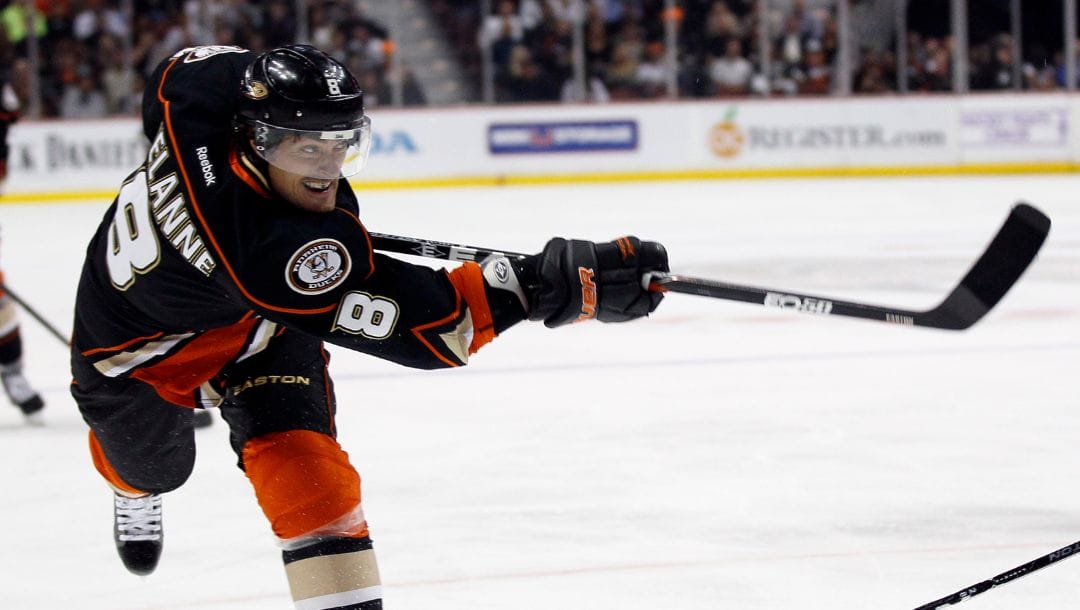 FILE - In this Oct. 21, 2011, file photo, Anaheim Ducks right wing Teemu Selanne, of Finland, takes a shot against the Dallas Stars.