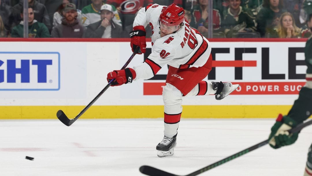 Carolina Hurricanes right wing Mikko Rantanen (96) shoots the puck against the Minnesota Wild during the second period.