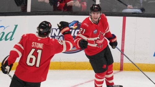 Canada's Brayden Point (21) celebrates with teammate Mark Stone (6) after his goal against Finland during the first period of a 4 Nations Face-Off hockey game, Monday, Feb. 17, 2025, in Boston.