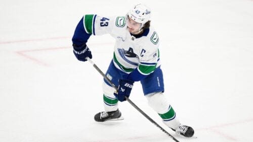Vancouver Canucks defenseman Quinn Hughes (43) in action during the third period of an NHL hockey game against the Washington Capitals, Wednesday, Jan. 8, 2025, in Washington. The Capitals won 2-1 in overtime.