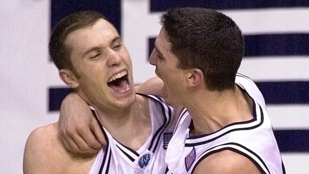 UNC-Wilmington guard Brett Blizzard, left, celebrates with Stewart Hare after their 66-51 win over Virginia Commonwealth in the Colonial Athletic Association Tournament championship game at the Coliseum in Richmond, Va., Monday, March 4, 2002.