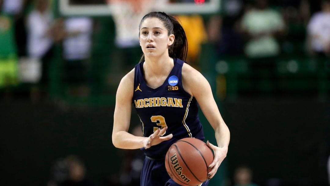 Michigan guard Katelynn Flaherty (3) handles the ball during a second-round game against Baylor at the NCAA women's.
