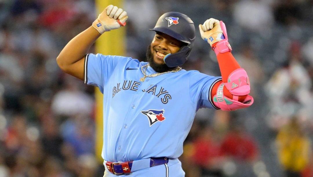 Toronto Blue Jays' Vladimir Guerrero Jr. gestures on second after a double in the fifth inning of a baseball game.