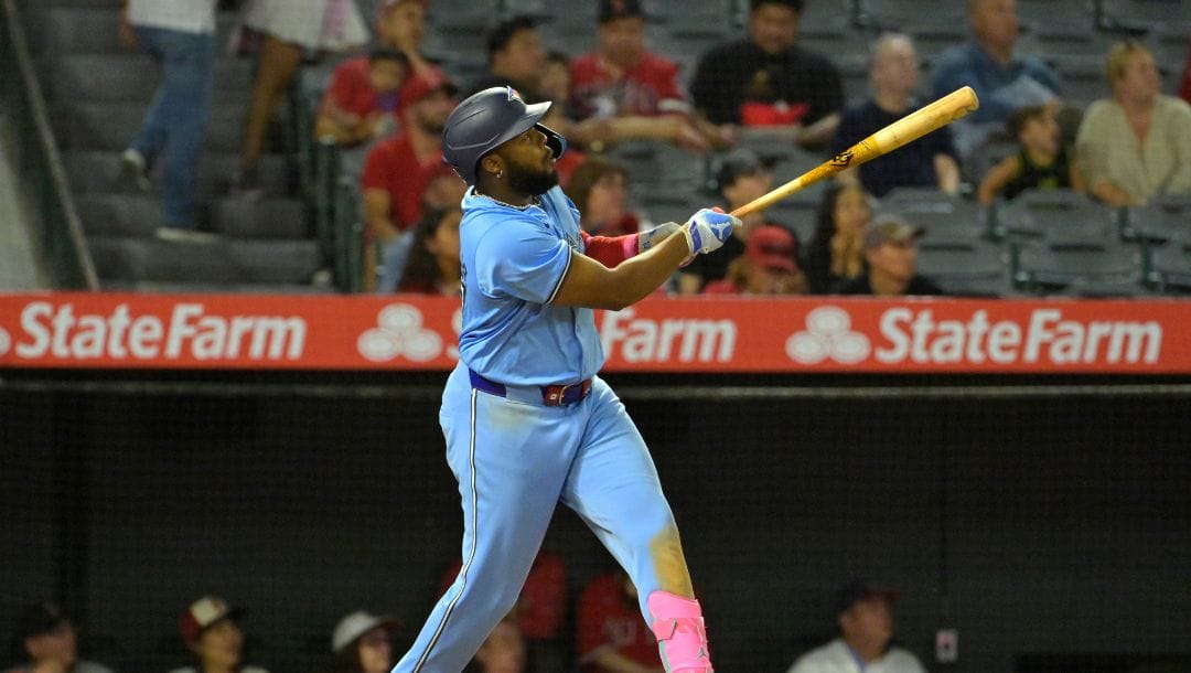 Toronto Blue Jays' Vladimir Guerrero Jr. hits a two-run home run in the ninth inning of a baseball game against the Los Angeles.