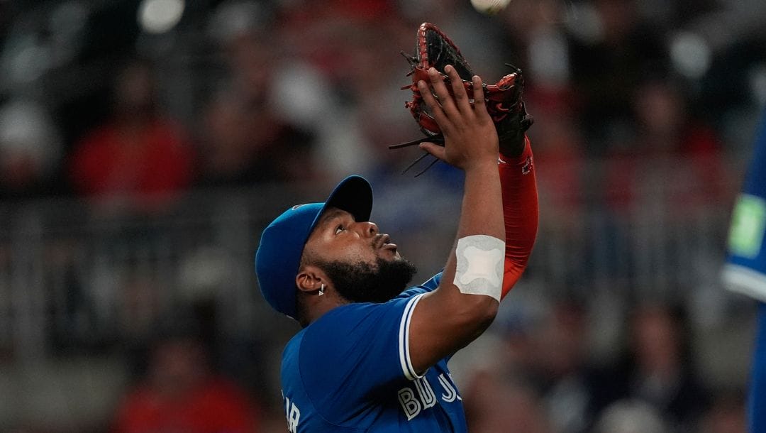 Toronto Blue Jays first base Vladimir Guerrero Jr. catches a fly ball to retire Atlanta Braves' Gio Urshela in the fourth inning.