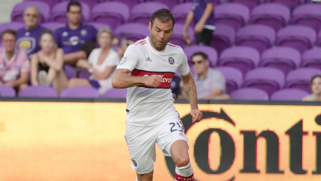 Chicago Fire's Nemanja Nikolic moves the ball against Orlando City during the second half of an MLS soccer match, Sunday.