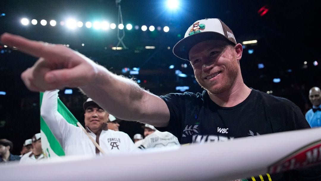 Canelo Alvarez celebrates after defeating Edgar Berlanga in a super middleweight title bout Saturday, Sept. 14, 2024, in Las Vegas.