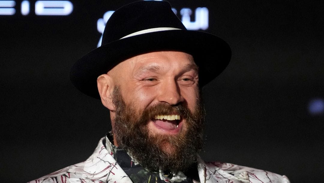 Boxer Tyson Fury speaks during a press conference in Riyadh, Saudi Arabia, Thursday, Dec. 19, 2024 ahead of the WBA, WBO.