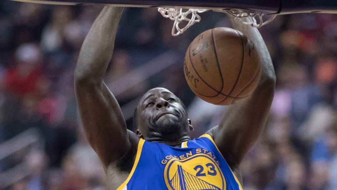 Draymond Green of the Golden State Warriors dunks in a game against the Washington Wizards at Verizon Center on February 28, 2017 in Washington, DC.