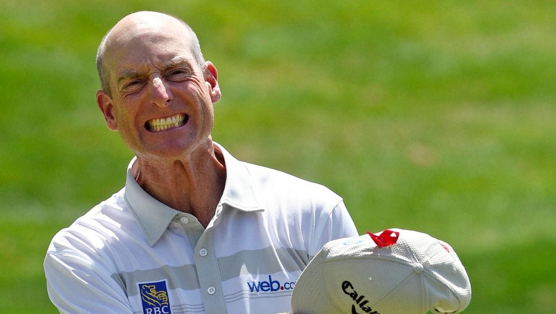Jim Furyk celebrates after shooting a course and PGA-record 58 during the final round of the Travelers Championship.