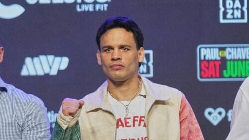 Boxers Jake Paul, left, poses with Julio Cesar Chavez Jr, Mexico's former world champion, right, with CEO and Co-Founder.