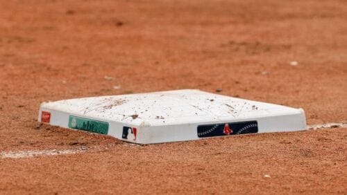 A Rawlings MLB base is seen with the Boston Red Sox logo before a baseball game between the Boston Red Sox and the New York Yankees Friday, June 16, 2023, at Fenway Park in Boston.