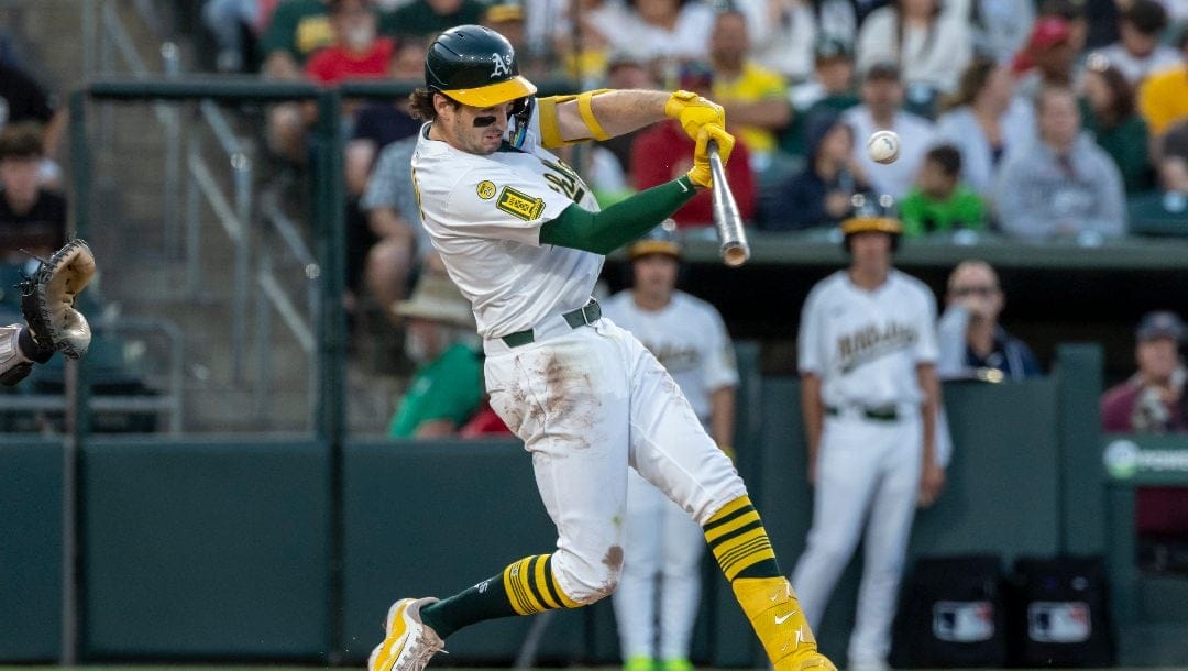 Athletics' Jacob Wilson hits an RBI single during the second inning of a baseball game against the Philadelphia Phillies Saturday, May 24, 2025, in West Sacramento, Calif.
