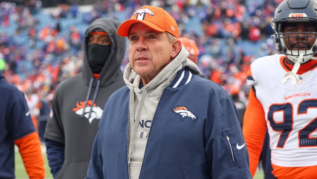 Denver Broncos head coach Sean Payton walks on the field before an NFL football game between the Buffalo Bills and the Denver Broncos, Sunday, Jan. 12, 2025, in Orchard Park, N.Y.