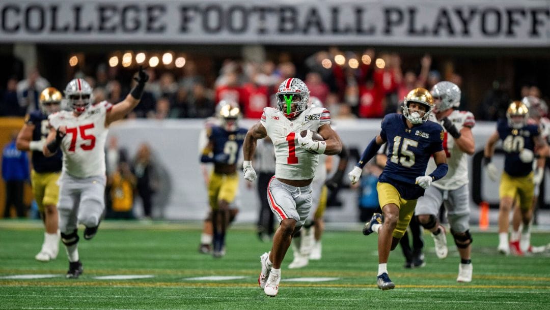 FILE - Ohio State running back Quinshon Judkins (1) runs with the ball against Notre Dame during the College Football Playoff.