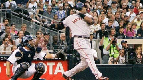 San Francisco Giants' Barry Bonds watches the flight of his home run, his 755th, during the second inning of a baseball game game against the San Diego Padres in San Diego, Saturday, Aug. 4, 2007.
