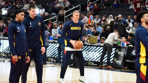 Nikola Jokic, Gary Harris, Jamal Murray and Mason Plumlee of the Denver Nuggets warming up prior to a road game against the Washington Wizards on January 4, 2020